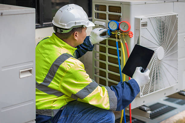 Professional Hvac technician working in Charleston, IL